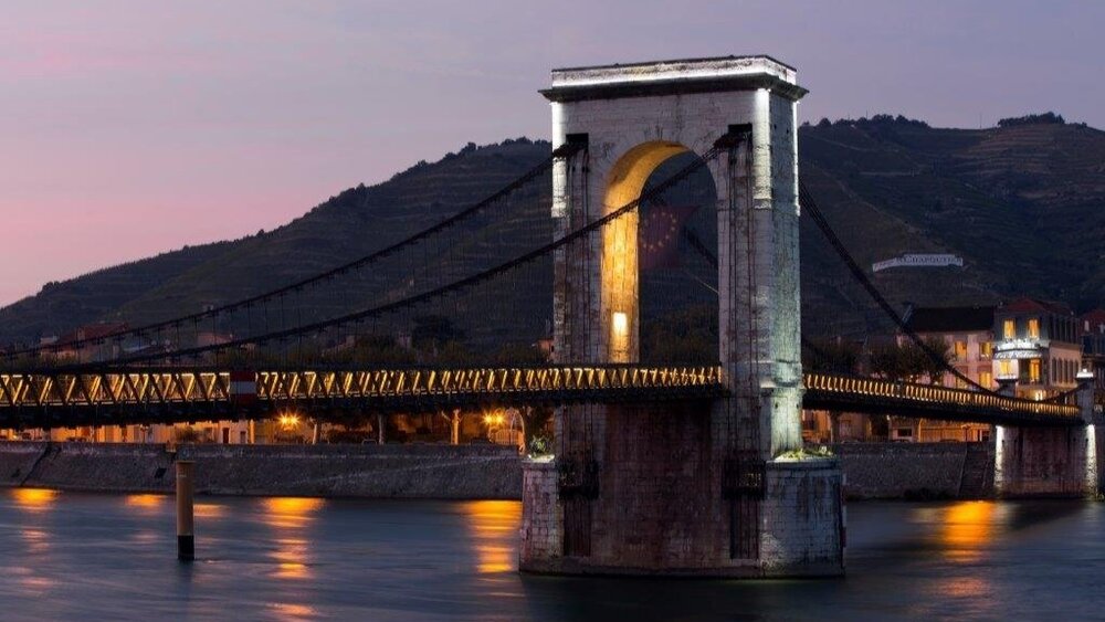 Pedestrian bridge over the rhone at tain l’hermitage leading to hotel 2Coteaux